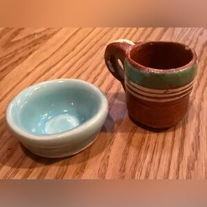 Small Mexican clay mug, also known as a jarrito,jarro.And studio ceramic bowl